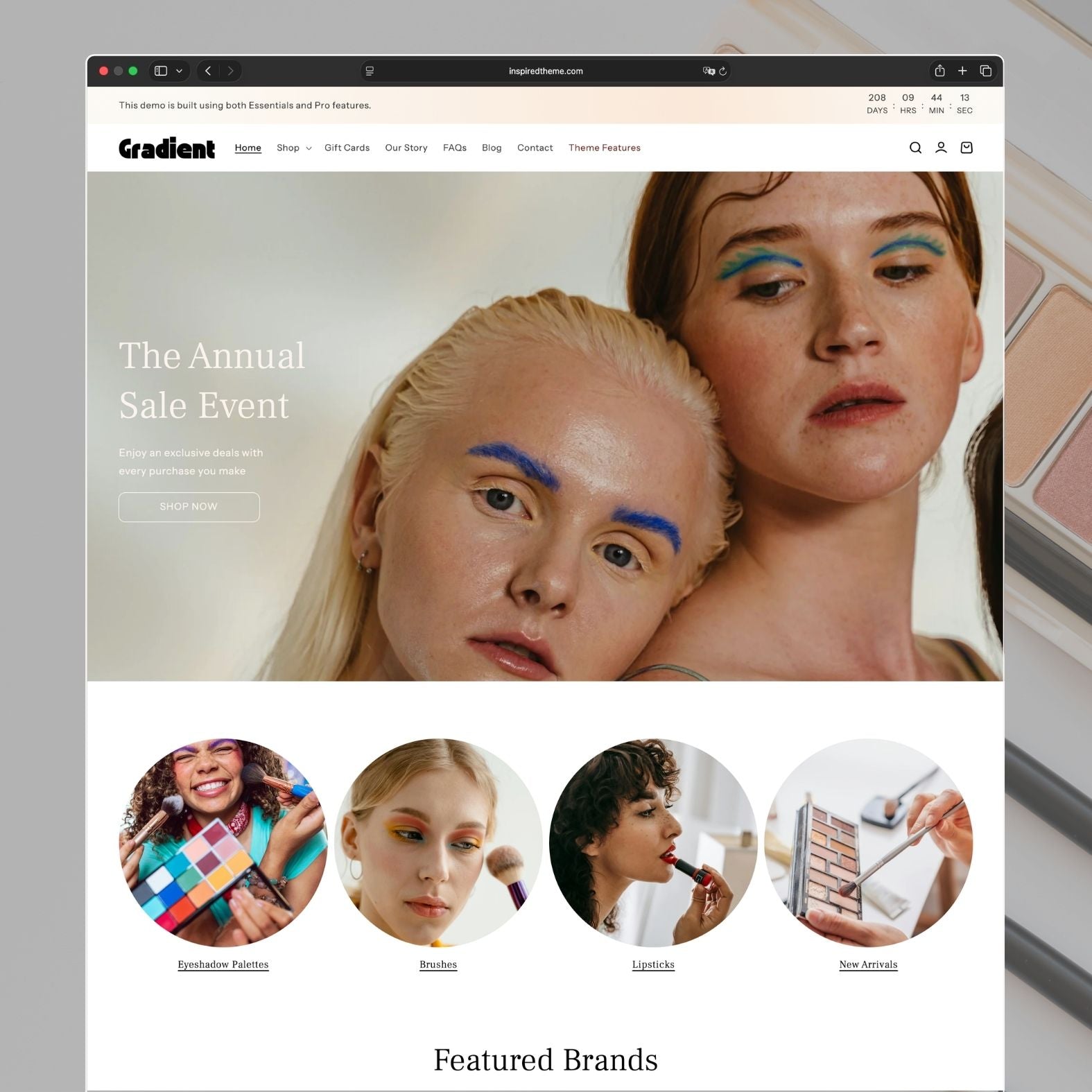 Gradient Shopify theme homepage for a colorful makeup and cosmetics brand with vibrant bold colors, hero banner showcasing makeup products, dynamic gradient design elements, and featured product collections